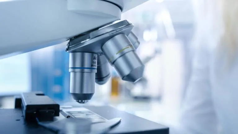 Analytical lab with assay validation, data review, and instrument qualification